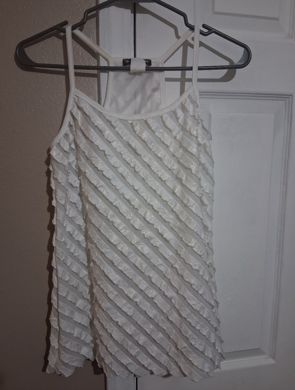 White Ruffled Diagonal Stripe Spaghetti Strap Tank With Micro Gold Splashes.